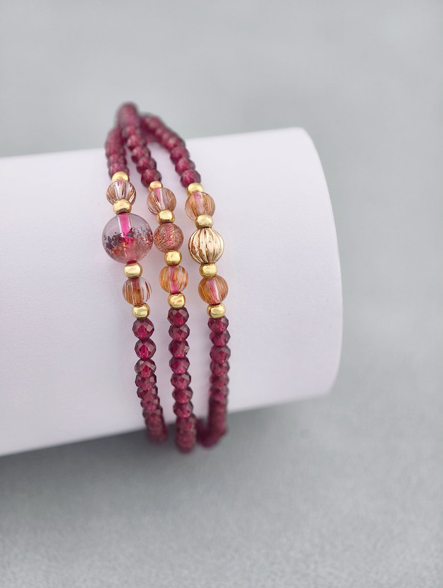 Natural Garnet and Copper Rutilated Quartz Super Seven Three-Wrap Bracelet